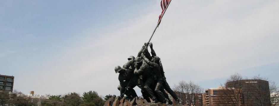 The iconic Iwo Jima Memorial commemorates the Bravery and Honor of the Corps The iconic Iwo Jima Memorial commemorates the Bravery and Honor of the Corps